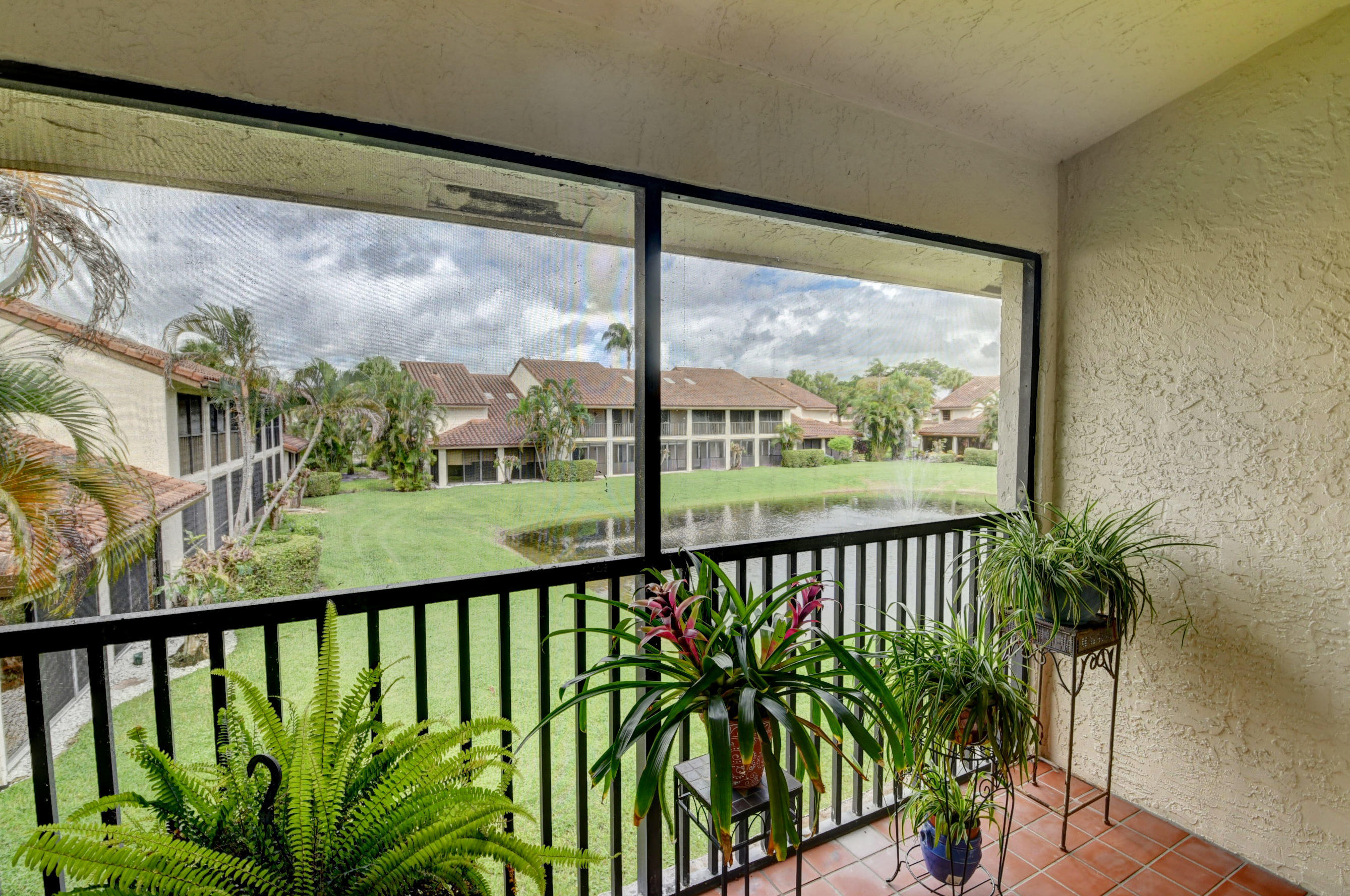 7861 La Mirada Drive Boca Raton, FL 33433 - Photo 4 of 26 a view of a street from a balcony
