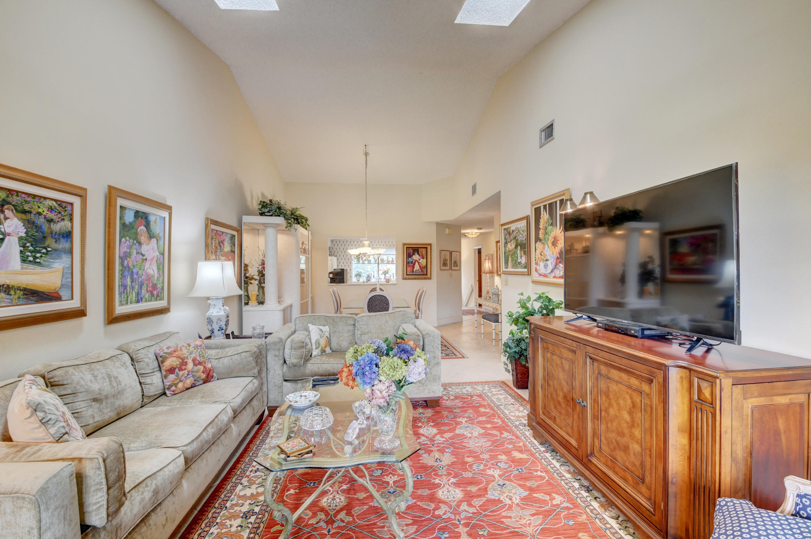 7861 La Mirada Drive Boca Raton, FL 33433 - Photo 8 of 26 a living room with furniture and a flat screen tv
