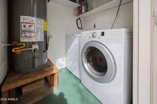 a utility room with dryer and washer
