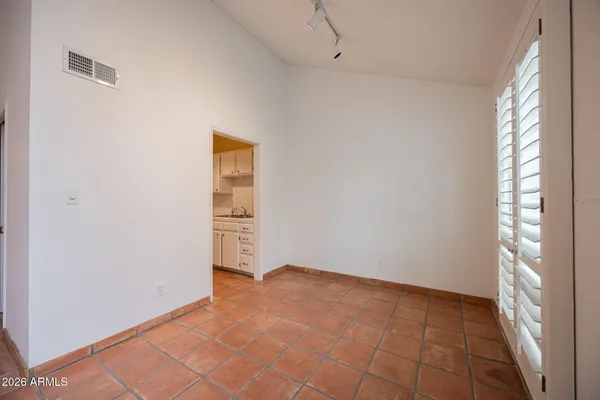 an empty room with windows