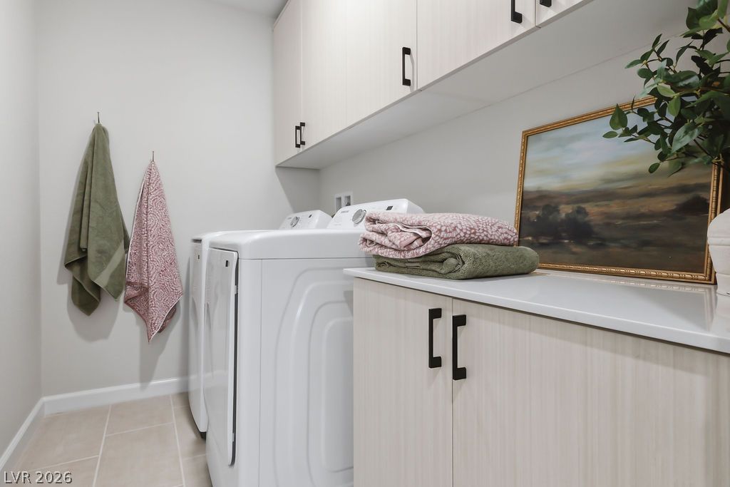 913 Cadence View Way Henderson, NV 89011 - Photo 32 of 46 Streamlined laundry area with convenient upper cabinetry and practical countertop space.