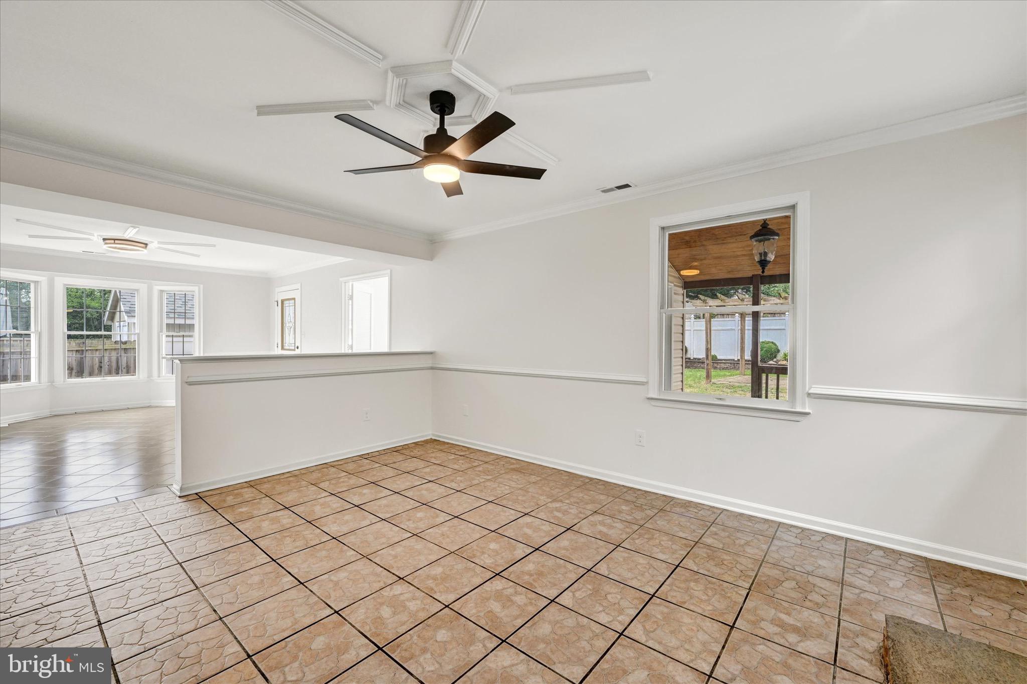 2108 Sunbriar Road Baltimore, MD 21207 - Photo 13 of 50 a view of an empty room with a window