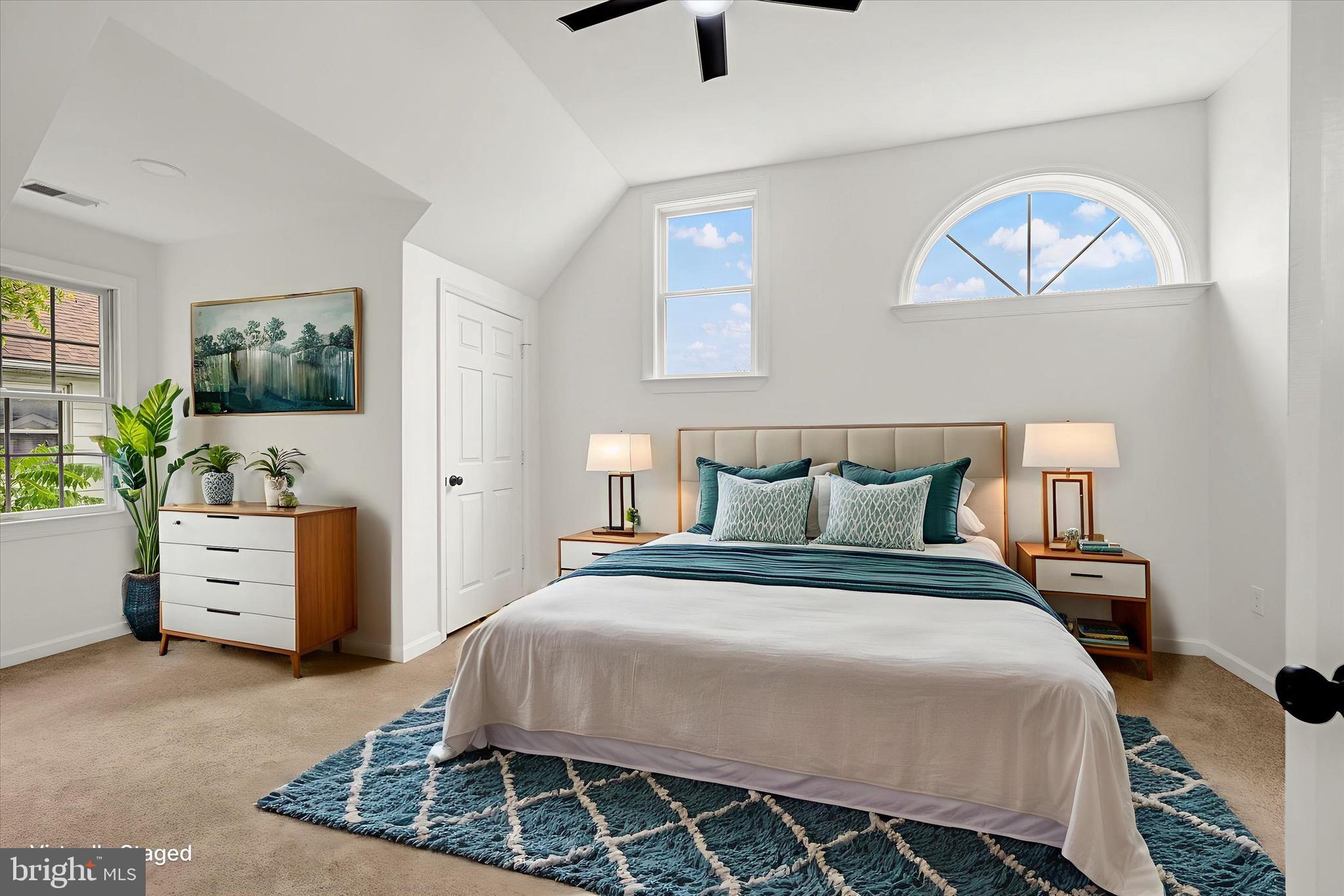 2108 Sunbriar Road Baltimore, MD 21207 - Photo 22 of 50 a bedroom with a bed and a desk