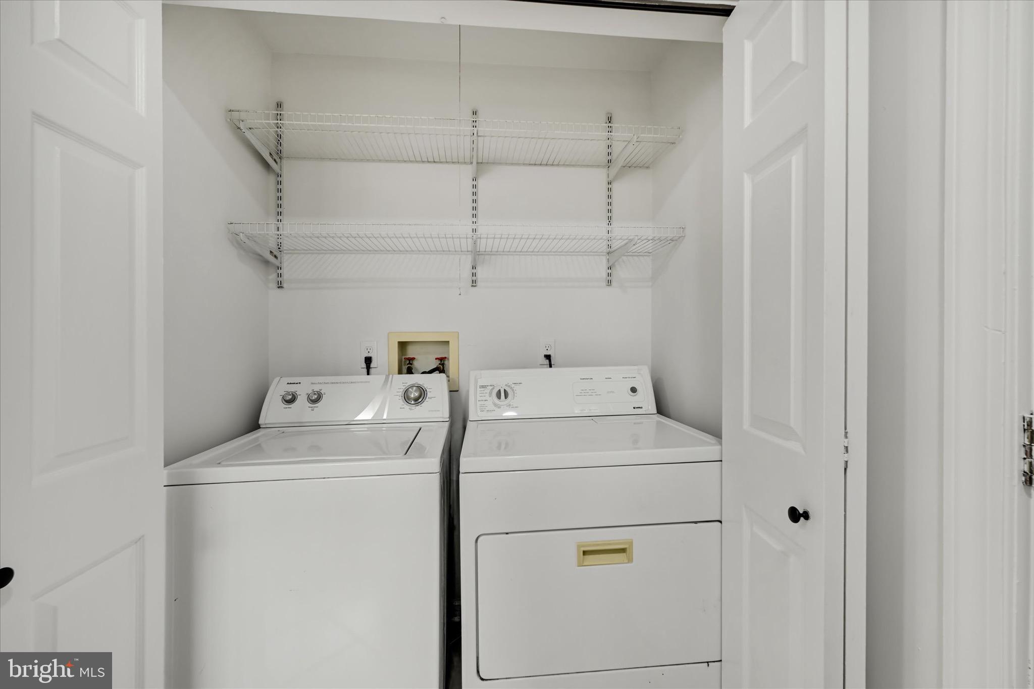2108 Sunbriar Road Baltimore, MD 21207 - Photo 28 of 50 a utility room with dryer and washer