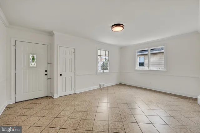 an empty room with windows