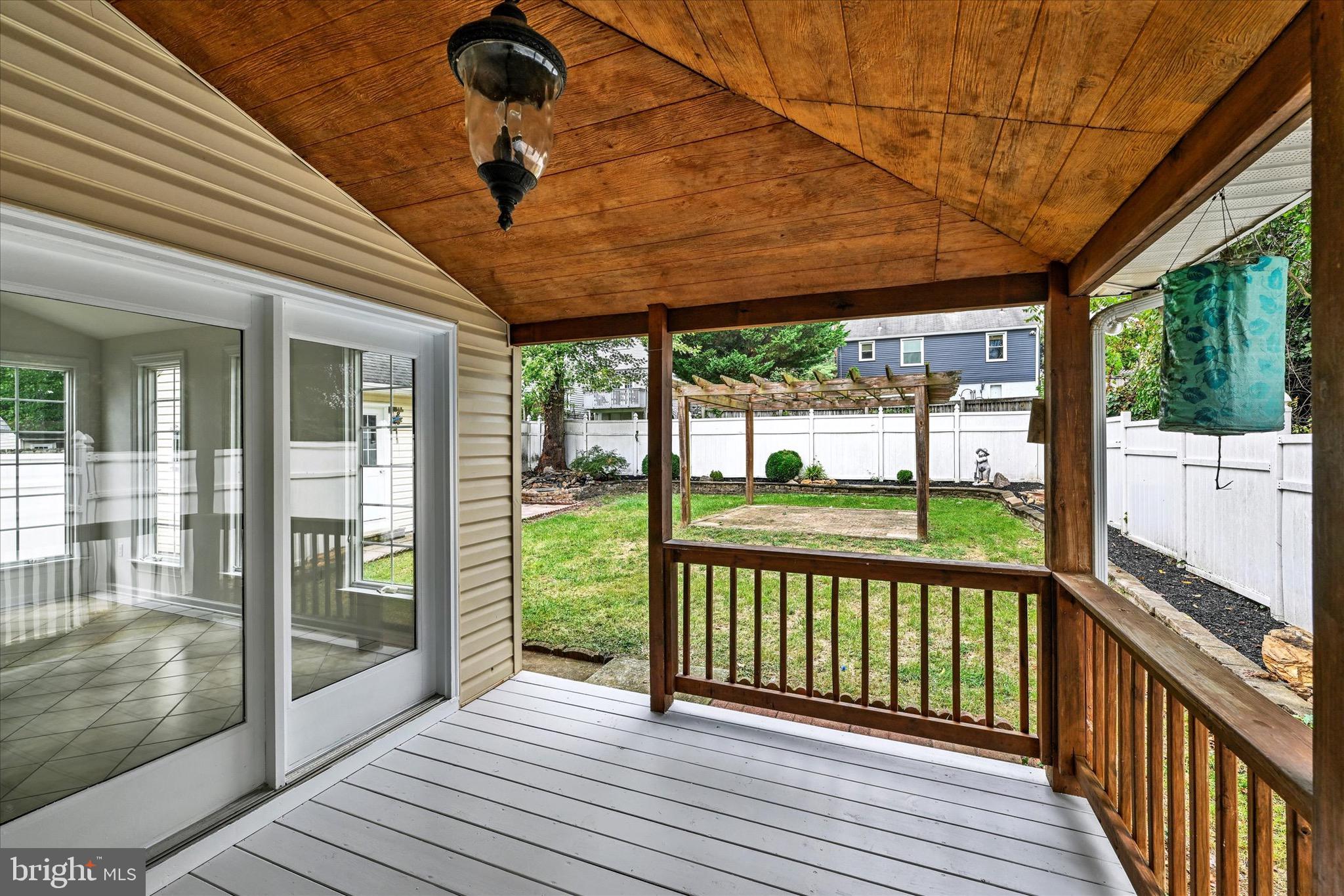 2108 Sunbriar Road Baltimore, MD 21207 - Photo 43 of 50 a view of a deck with wooden floor and outdoor space