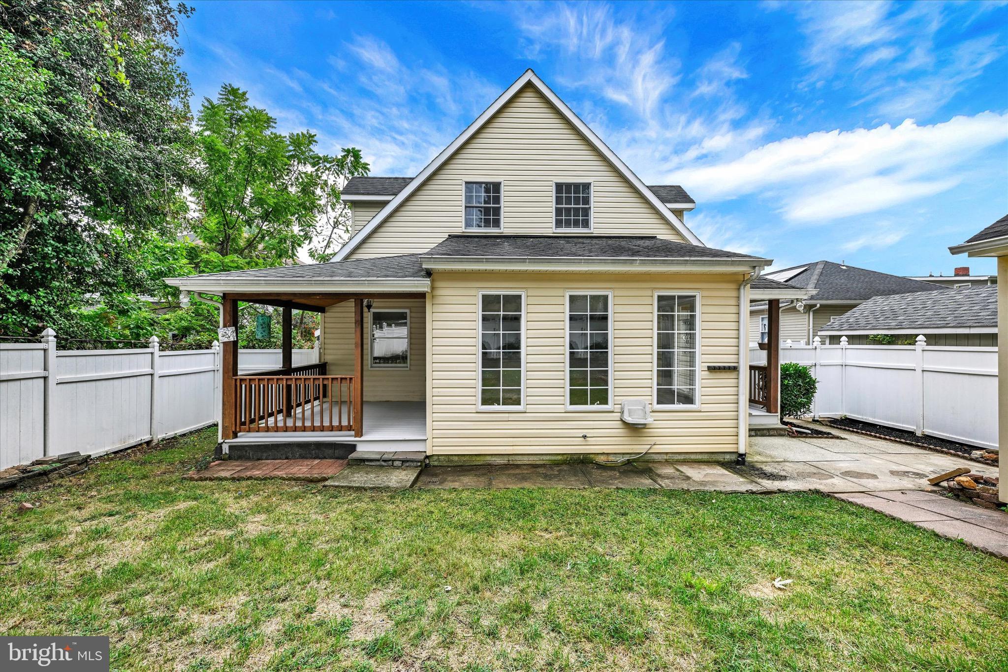 2108 Sunbriar Road Baltimore, MD 21207 - Photo 45 of 50 a front view of a house with a yard