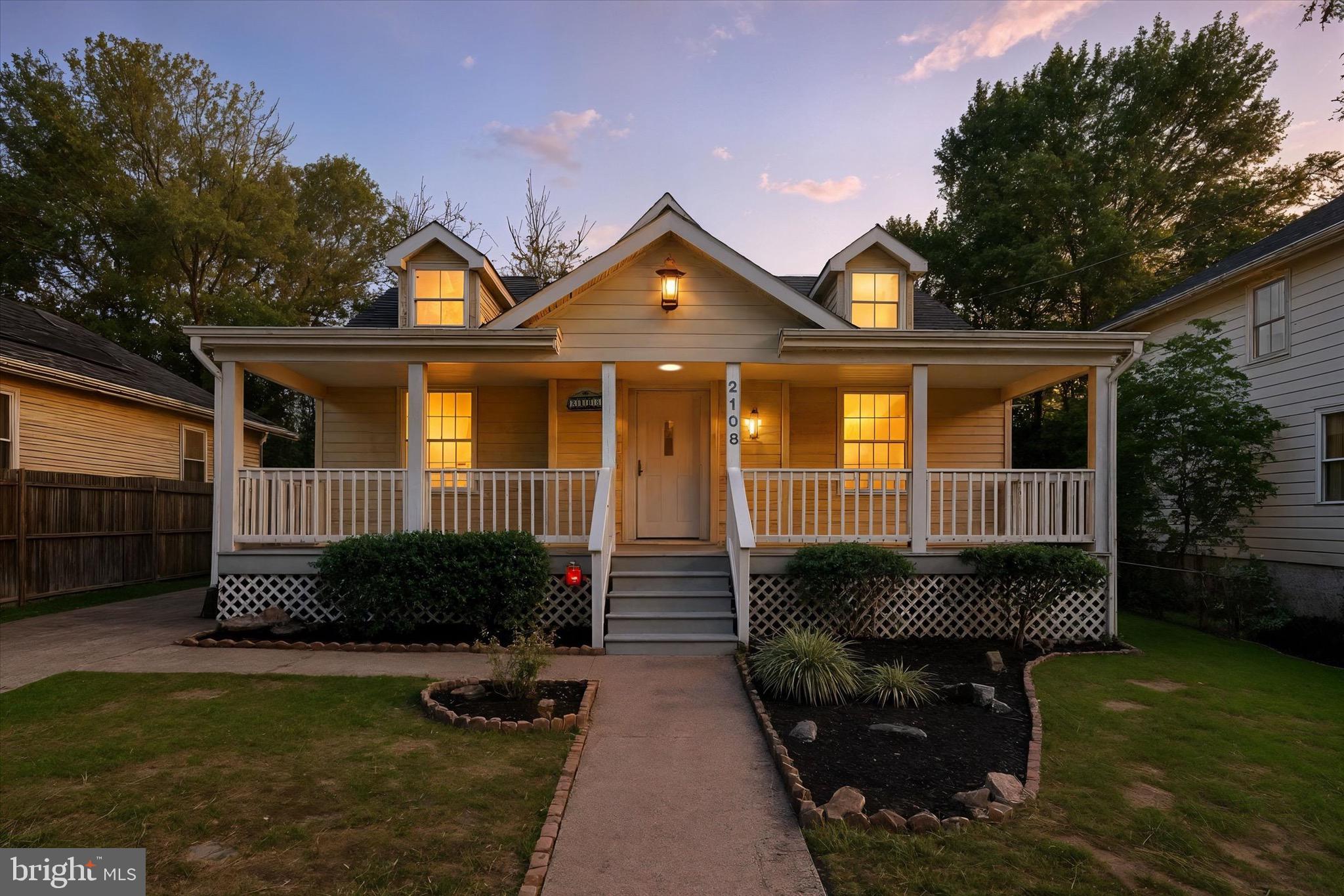 2108 Sunbriar Road Baltimore, MD 21207 - Photo 47 of 50 a front view of a house with garden