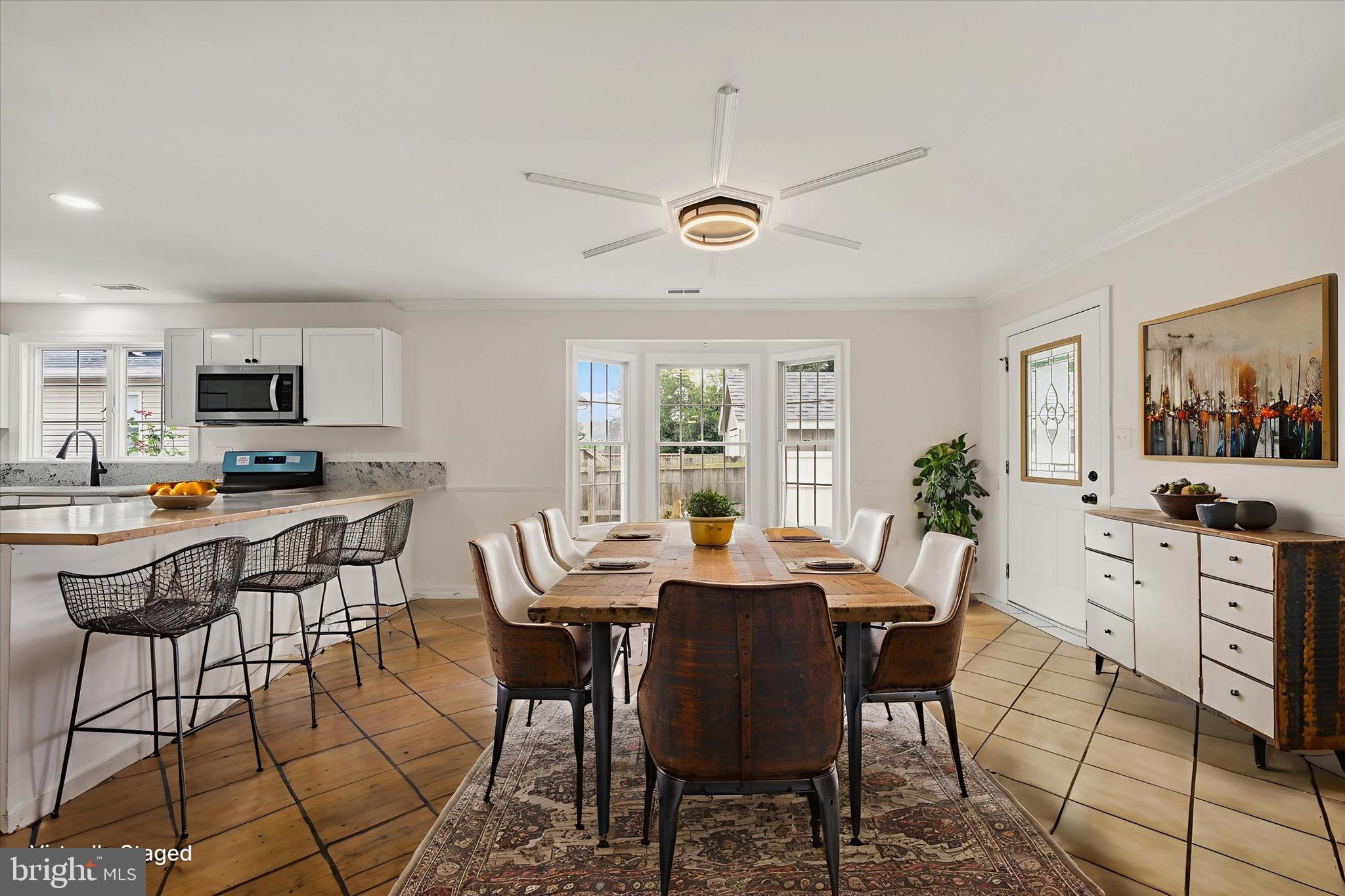 2108 Sunbriar Road Baltimore, MD 21207 - Photo 6 of 50 a view of a dining room with furniture