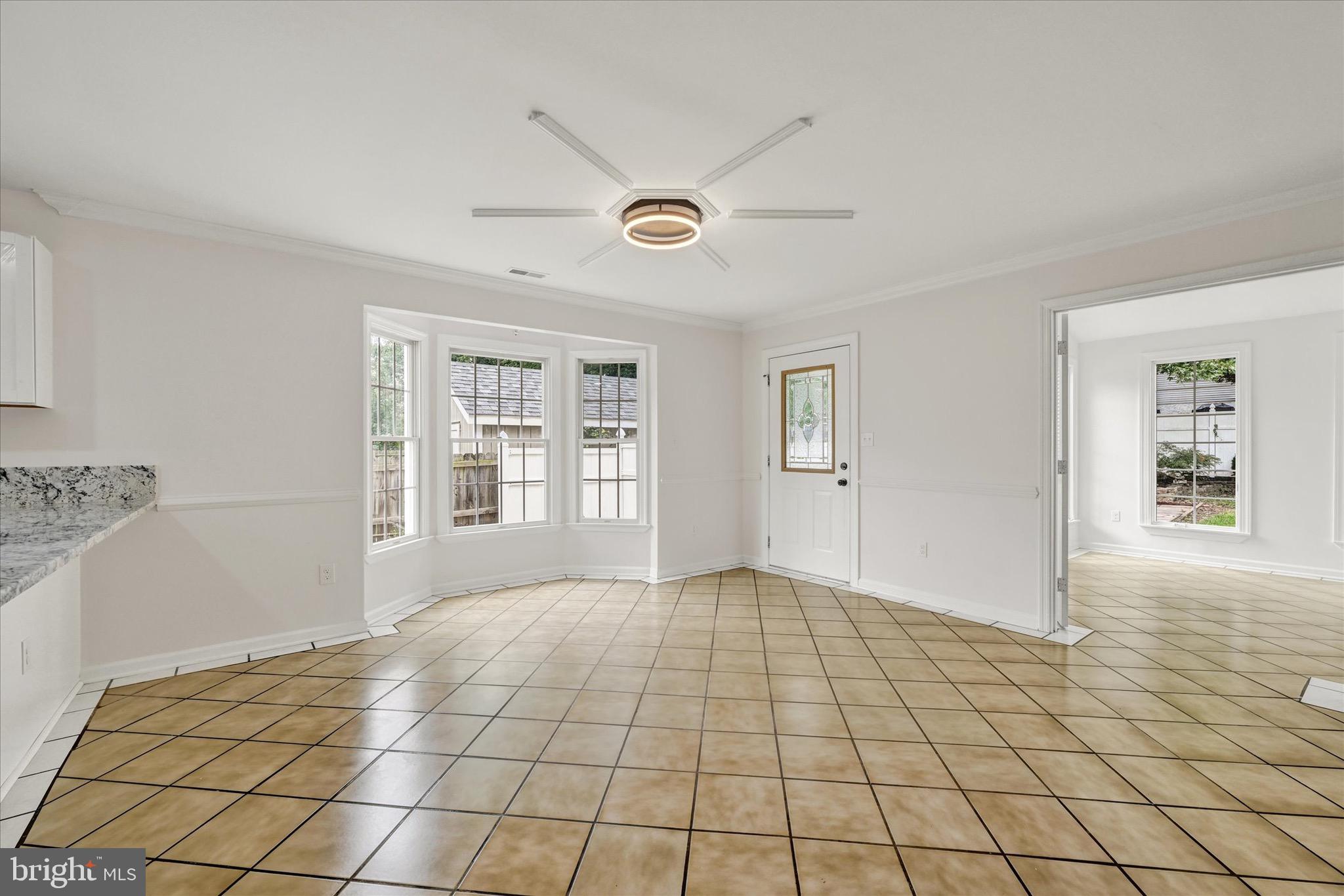2108 Sunbriar Road Baltimore, MD 21207 - Photo 8 of 50 a view of an empty room and window