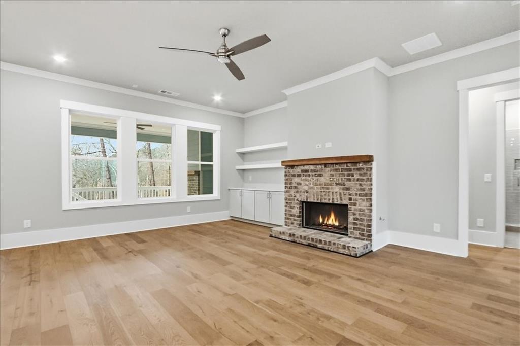 216 Ewing Way Dacula, GA 30019 - Photo 24 of 80 a view of an empty room with window and fire place