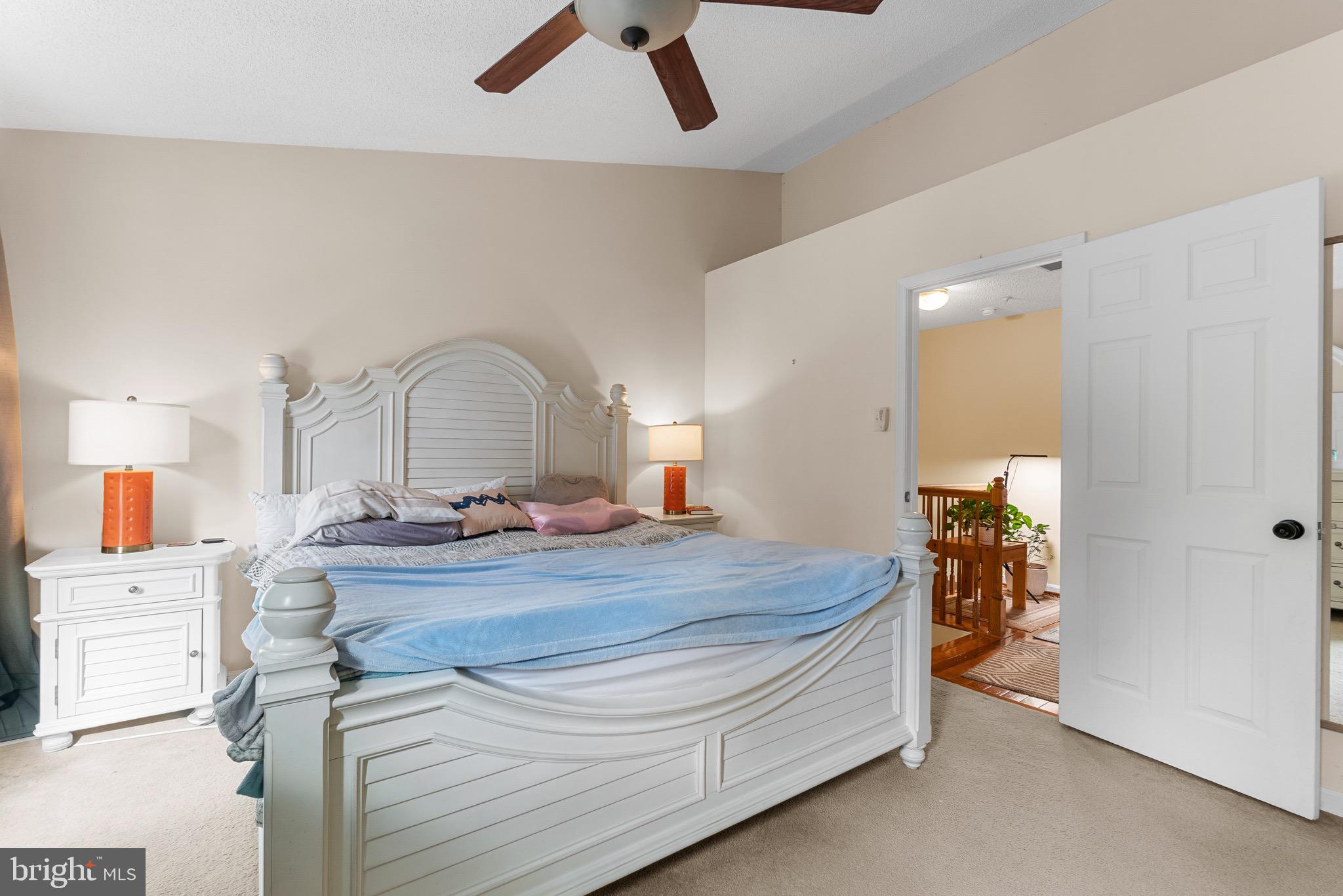 14010 Valleyfield Drive Silver Spring, MD 20906 - Photo 16 of 24 a bedroom with a bed and a dresser