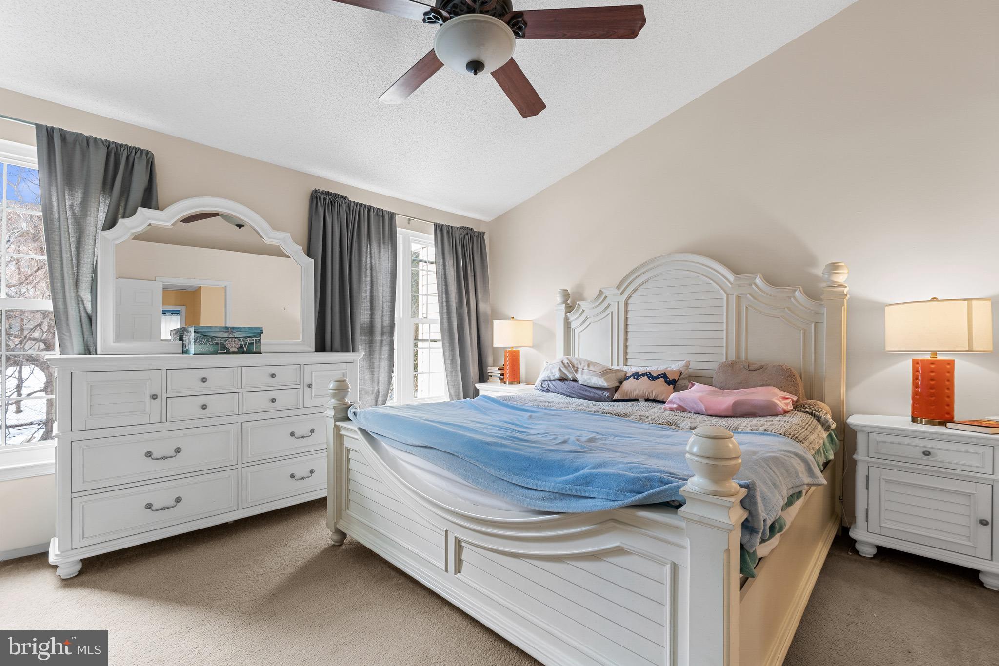 14010 Valleyfield Drive Silver Spring, MD 20906 - Photo 17 of 24 a bedroom with bed and a dresser