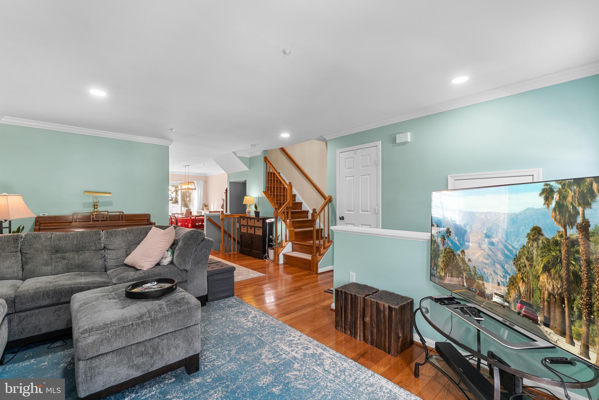 14010 Valleyfield Drive Silver Spring, MD 20906 - Photo 7 of 24 a living room with furniture and wooden floor