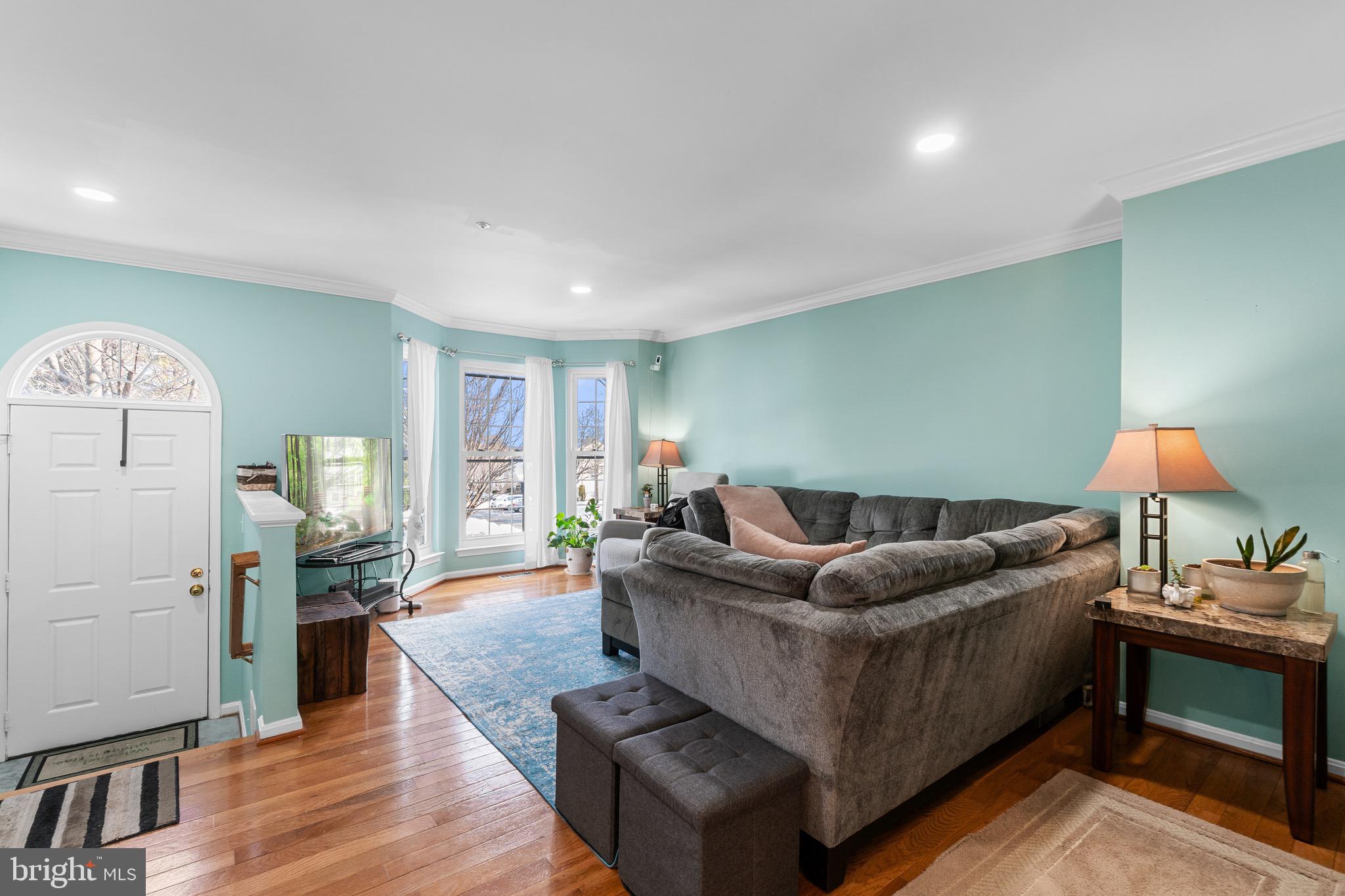14010 Valleyfield Drive Silver Spring, MD 20906 - Photo 8 of 24 a living room with furniture and wooden floor