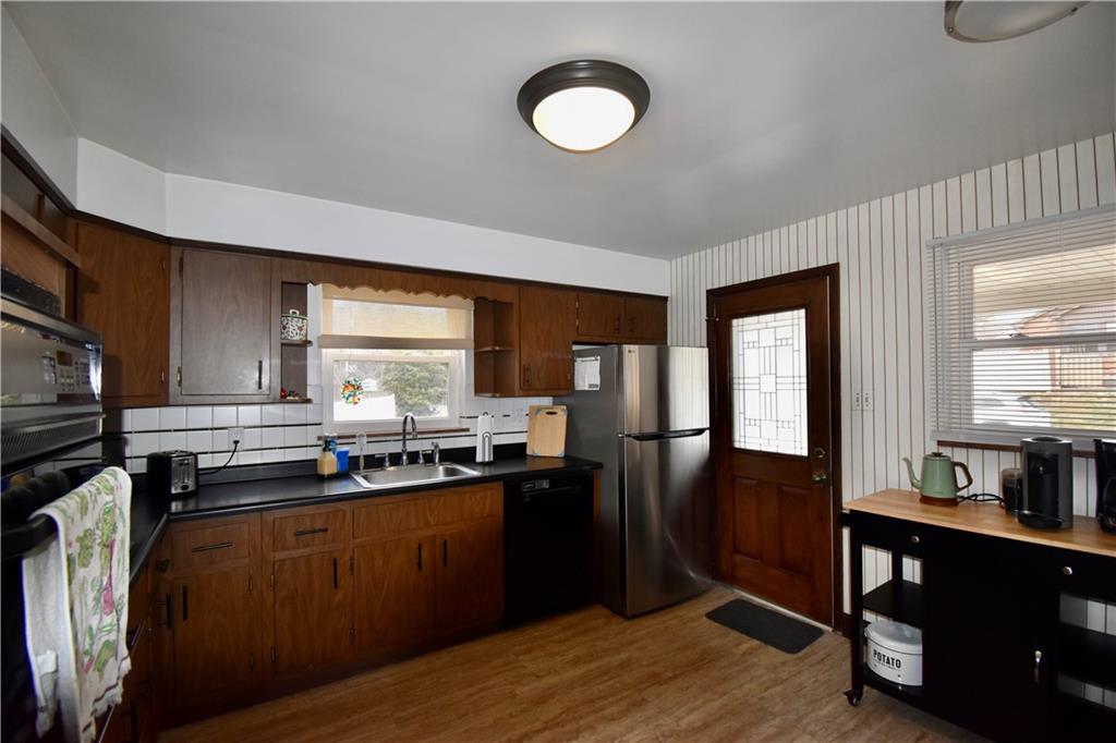 595 Maple Avenue Springdale, PA 15144 - Photo 23 of 44 Kitchen has all appliances dishwasher, gas cook top, oven microwave and refrigerator.