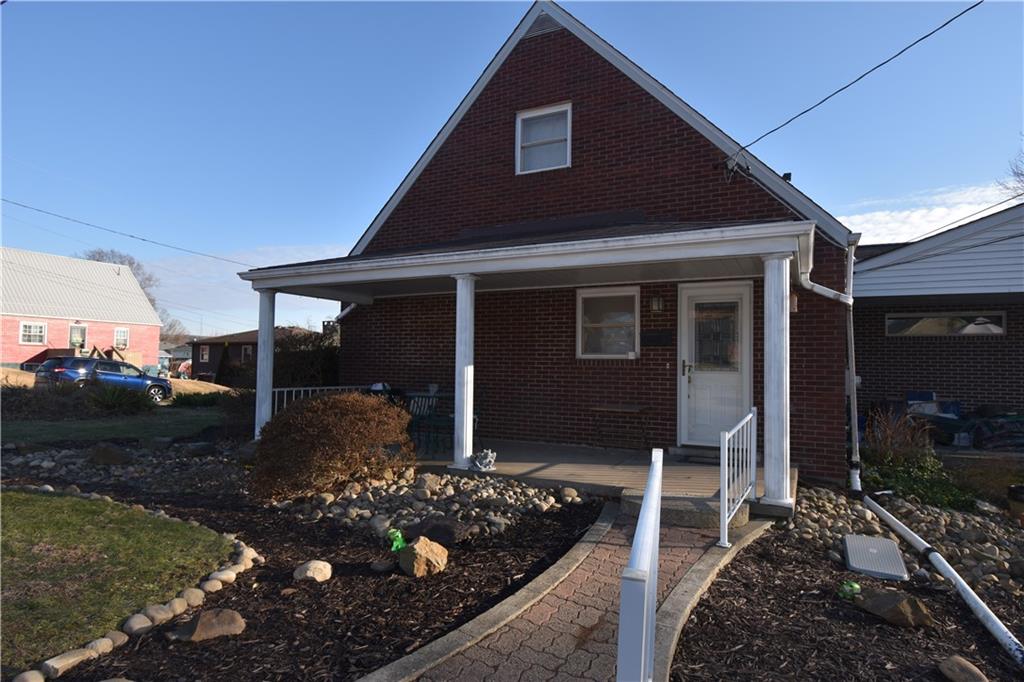 595 Maple Avenue Springdale, PA 15144 - Photo 28 of 44 Covered side porch from kitchen for easy grilling
