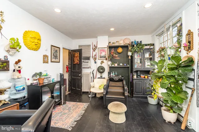 a view of a workspace with furniture