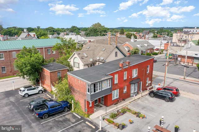 an aerial view of a house with a garden view