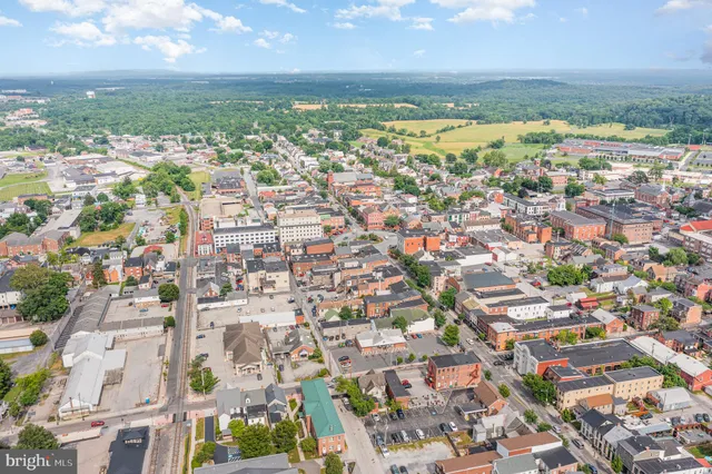 an aerial view of residential building with outdoor space