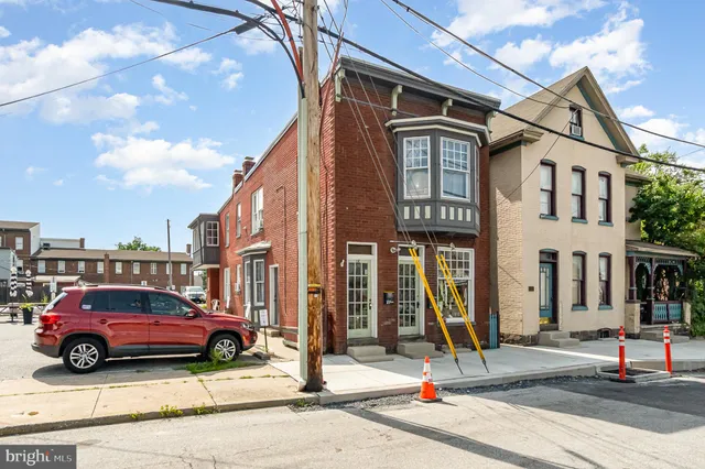 a car parked in front of a house