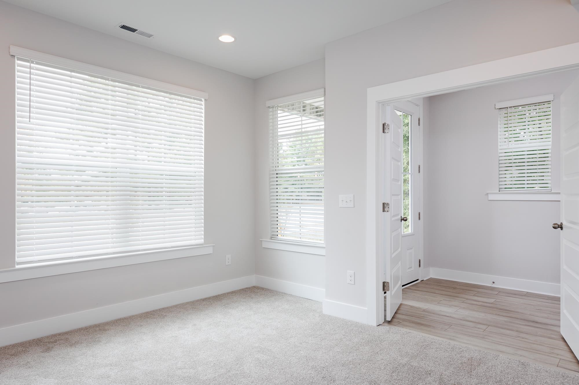 8236 Ebenezer Church Road Raleigh, NC 27613 - Photo 13 of 17 a view of an empty room with a window