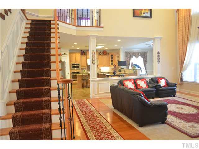 206 Powers Ferry Road Cary, NC 27519 - Photo 22 of 25 Wood Staircase with Wrought-Iron Railings Staircase