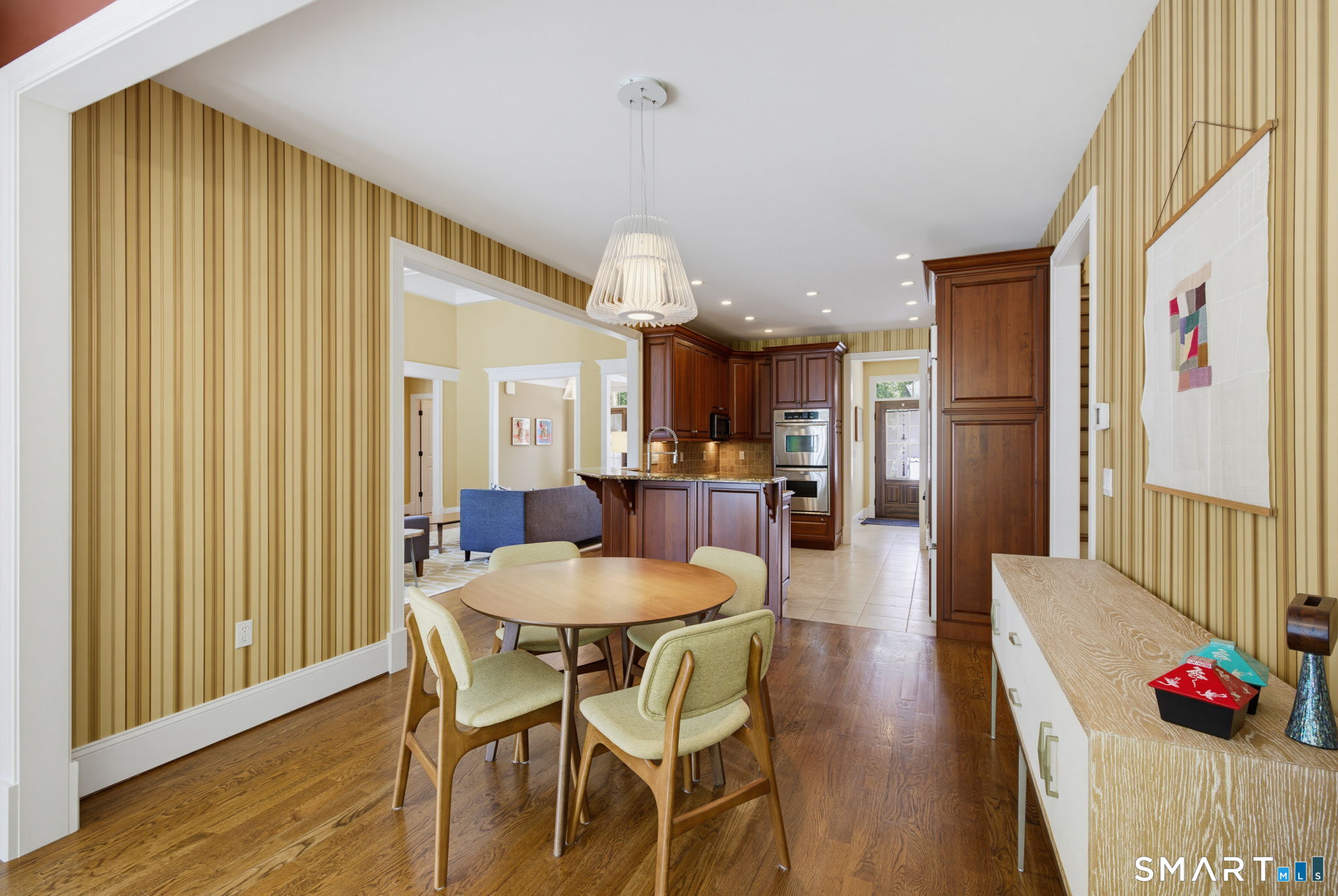 158 Appian Way Coventry, CT 06238 - Photo 19 of 40 a dining room with furniture and wooden floor