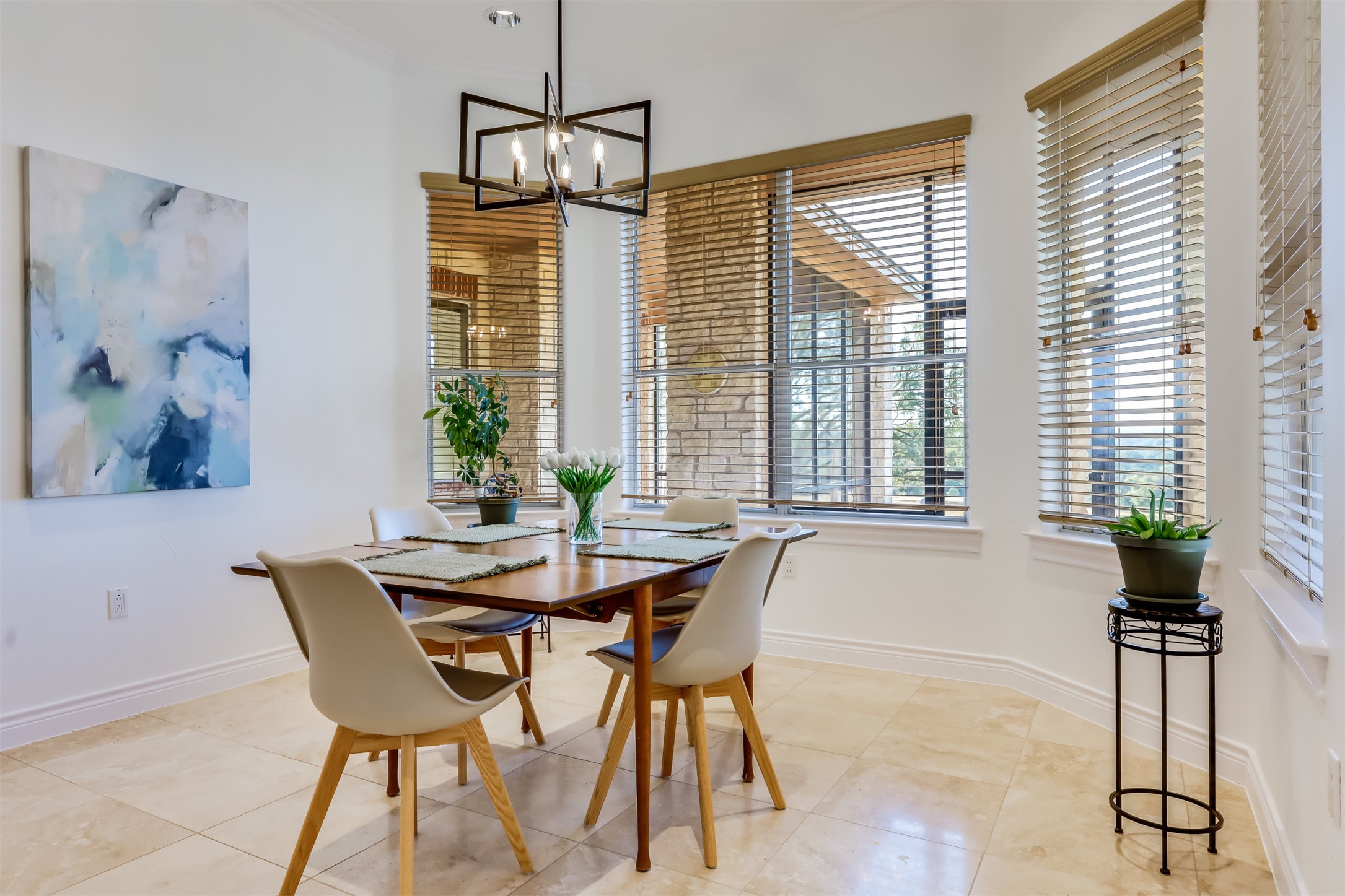 104 Running Brook Trail Spicewood, TX 78669 - Photo 11 of 40 a dining room with furniture and windows