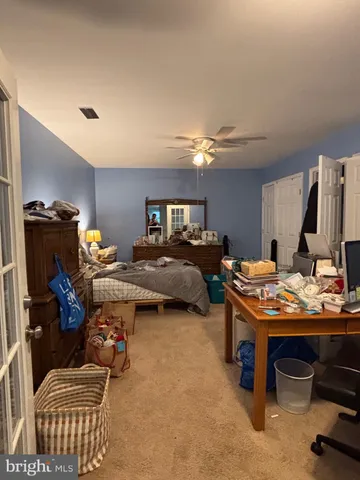 a bedroom with furniture and a equipment