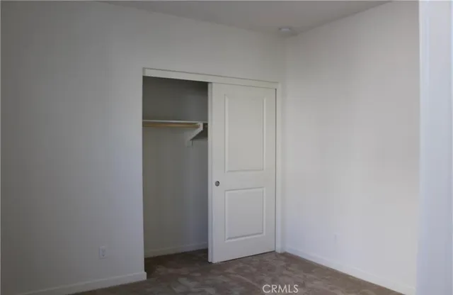 a view of a kitchen with electric appliances