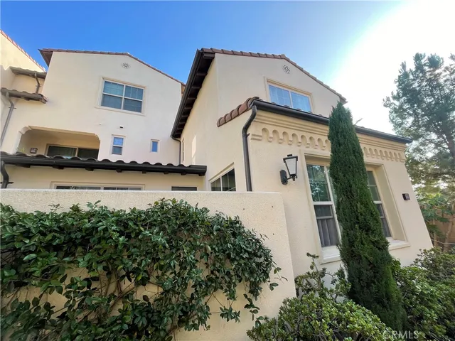 a view of a house with a street