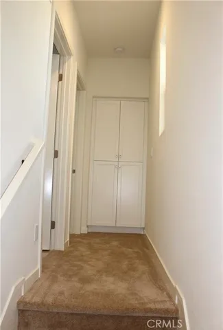 a view of empty room with windows