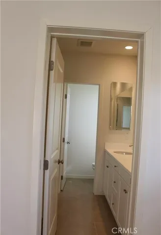 a view of a utility room with staircase