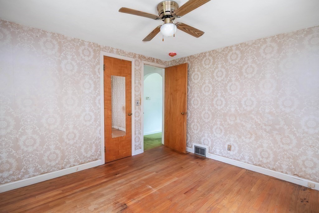 5 Clough Street Springfield, MA 01118 - Photo 13 of 26 wooden floor in an empty room