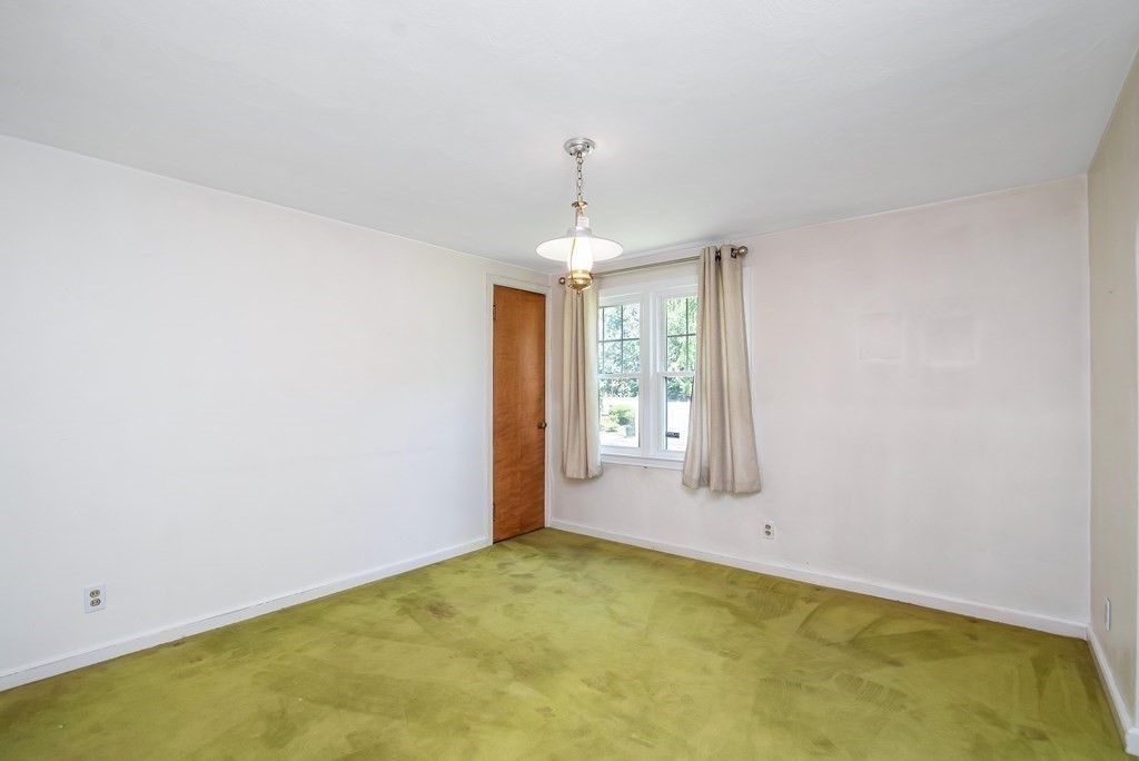 5 Clough Street Springfield, MA 01118 - Photo 9 of 26 an empty room with windows