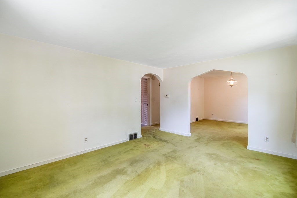 5 Clough Street Springfield, MA 01118 - Photo 10 of 26 an empty room with a door