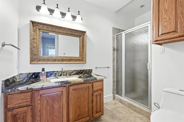 a swimming pool with outdoor seating and yard