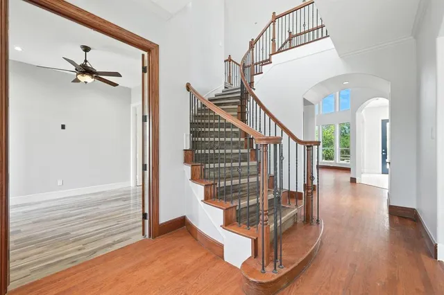a view of entryway with wooden floor