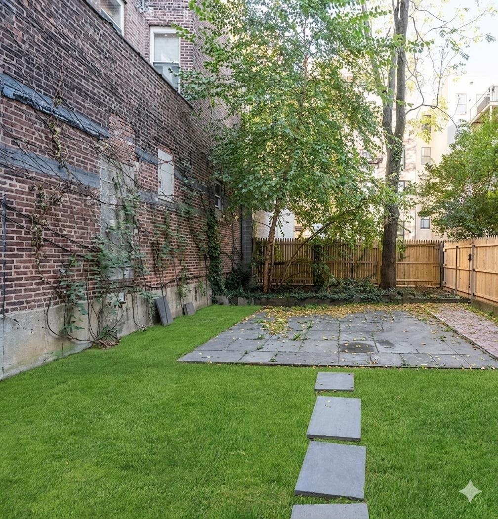 421 Adams Street, Unit 2L Hoboken, NJ 07030 - Photo 15 of 19 a view of yard with green space