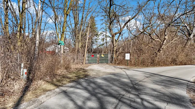 an aerial view of residential house with outdoor space