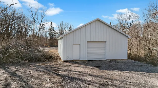 a view of a backyard of the house