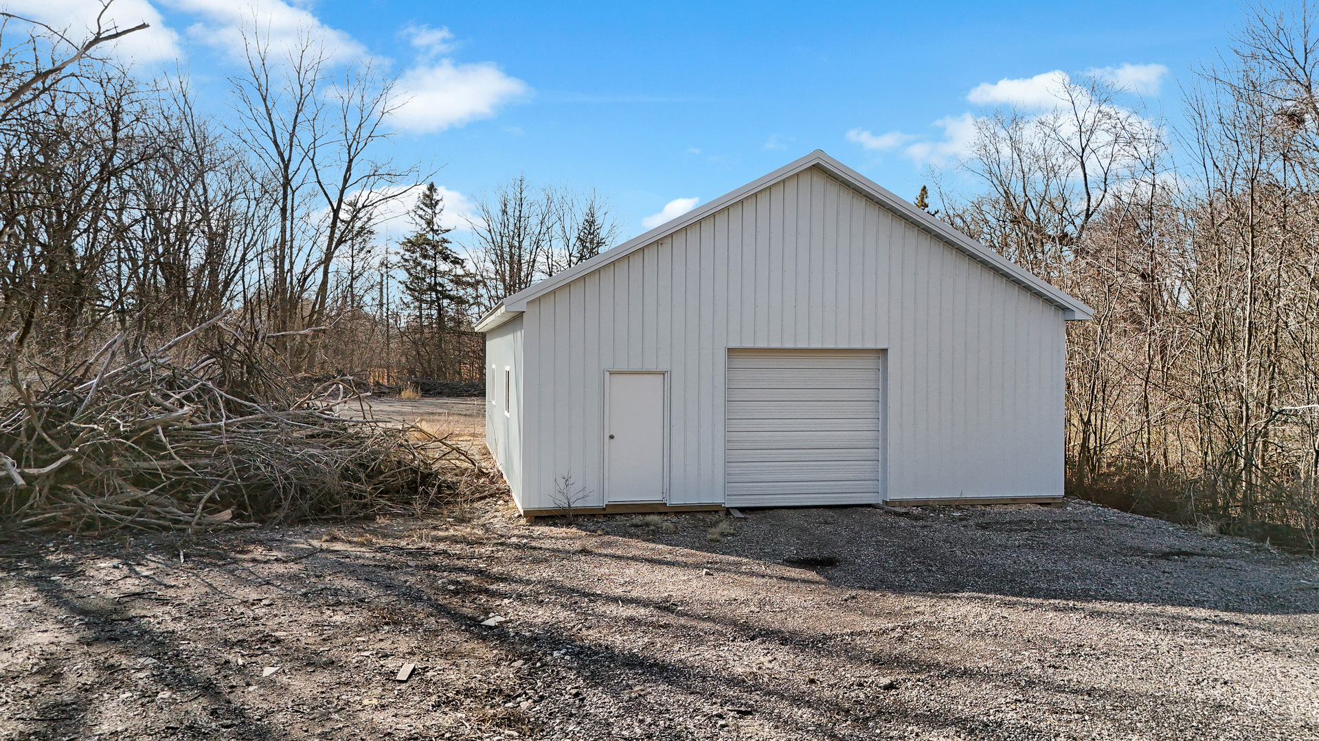 30W701 Lee Road West Chicago, IL 60185 - Photo 9 of 17 a view of house with yard and garage