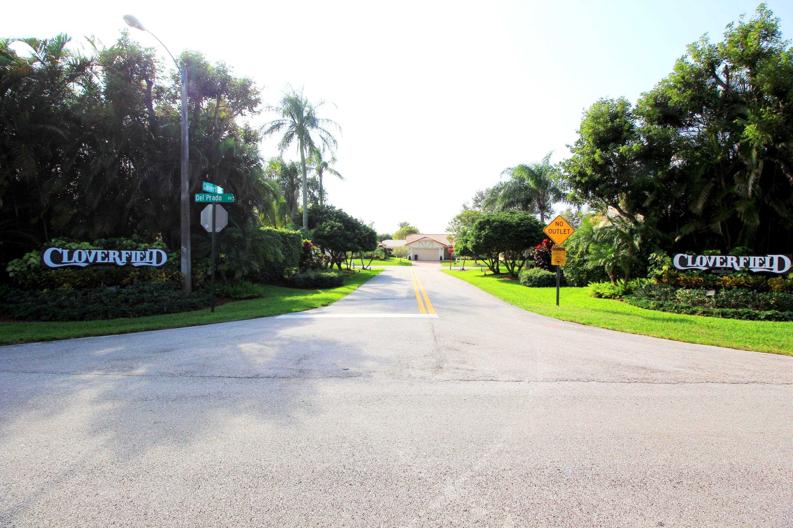 7751 Cloverfield Circle Boca Raton, FL 33433 - Photo 26 of 26 a view of road with plants and trees
