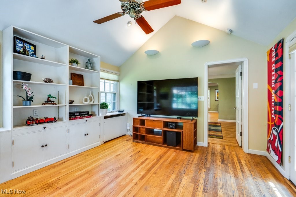 2500 Eaton Road Cleveland, OH 44118 - Photo 25 of 50 Living room featuring a ceiling fan, light wood-type flooring, and lofted ceiling