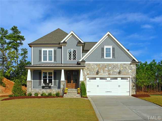 2305 Finley Ridge Lane Raleigh, NC 27615 - Photo 1 of 25 a front view of a house with a yard