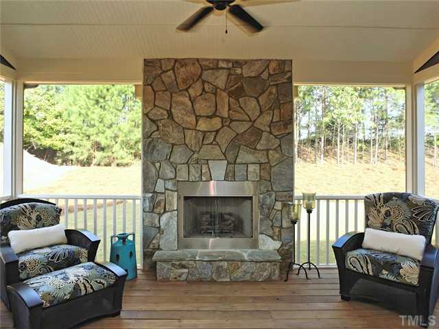 2305 Finley Ridge Lane Raleigh, NC 27615 - Photo 11 of 25 a living room with furniture and a fireplace