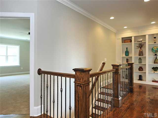 2305 Finley Ridge Lane Raleigh, NC 27615 - Photo 19 of 25 a view of a hallway with windows