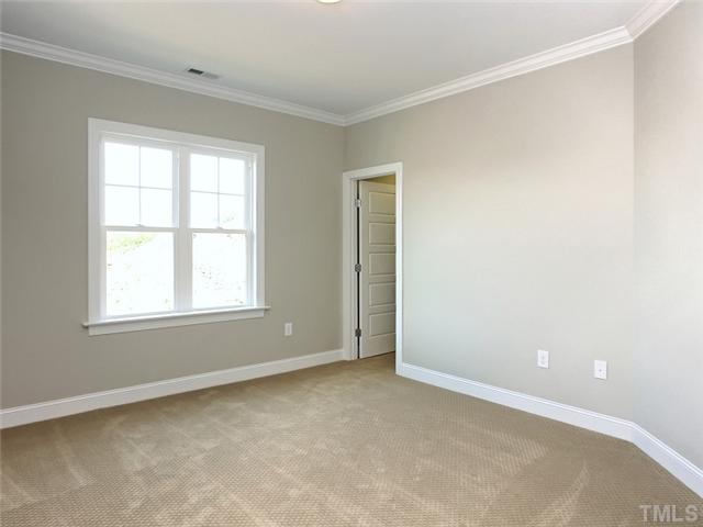 2305 Finley Ridge Lane Raleigh, NC 27615 - Photo 21 of 25 an empty room with a window