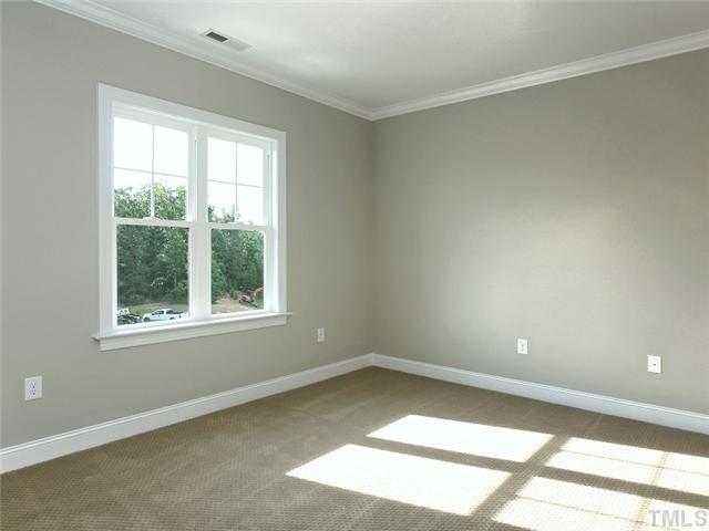 2305 Finley Ridge Lane Raleigh, NC 27615 - Photo 22 of 25 an empty room with a window